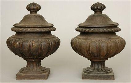 Appraisal: PAIR OF CAST IRON LIDDED URNS in tall Christie's lot