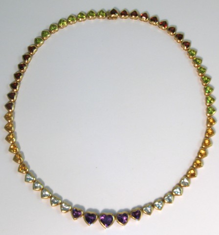 Appraisal: MULTI-COLOR GEMSTONE NECKLACE The k yellow gold necklace is -