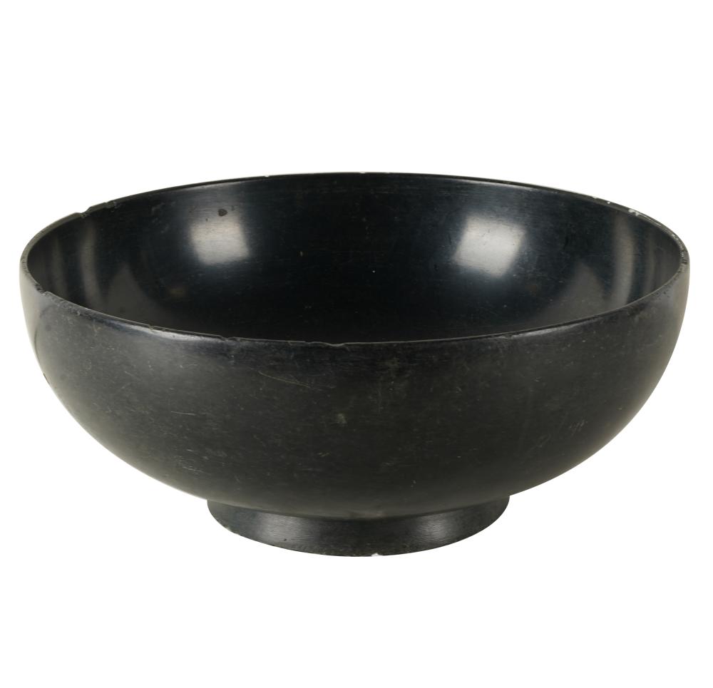 Appraisal: CARVED BLACK STONE BOWLProvenance The Estate of Barry Tarlow Los