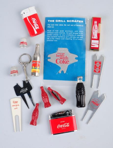 Appraisal: Lot Of Assorted Coca-Cola Items Includes golf divot fixers pencil