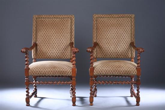 Appraisal: PAIR BAROQUE STYLE FRUITWOOD BARLEY-TWIST ARM CHAIRS th century with