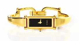 Appraisal: A gold plated stainless steel lady's Gucci quartz wristwatch with