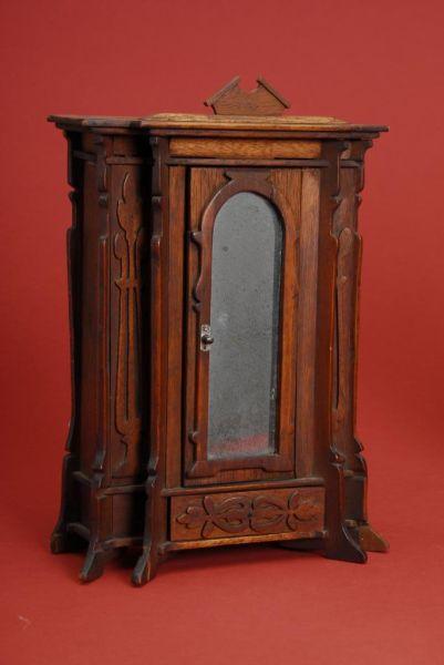 Appraisal: Walnut Victorian Miniature Armoire America late th century Art Nouveau