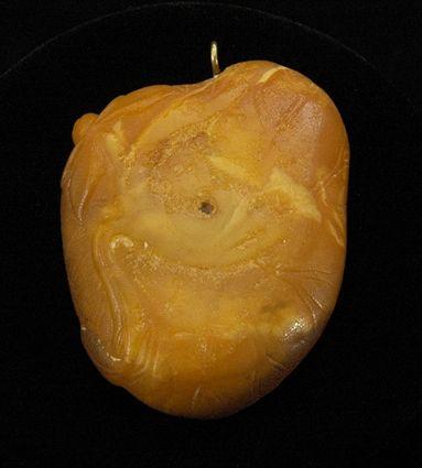 Appraisal: Carved Amber in the Form of Lotus Leaf