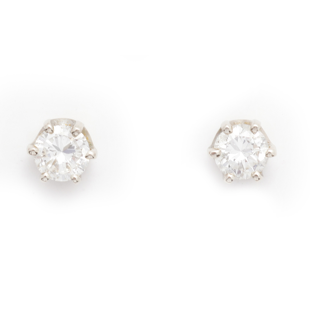 Appraisal: A pair of diamond stud earrings each claw set in