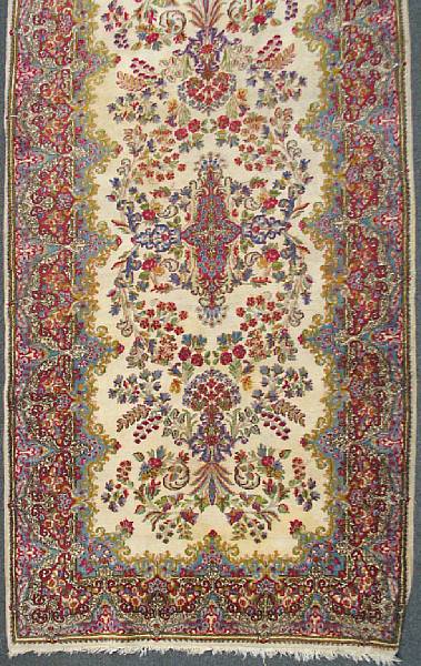 Appraisal: A Kerman carpet size approximately ft in x ft