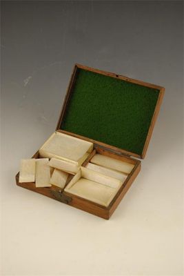 Appraisal: A Chinese hardwood and mother of pearl counter box containing