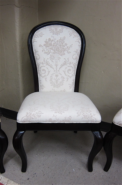 Appraisal: A SET OF FOUR DINING CHAIRS having molded dark wood