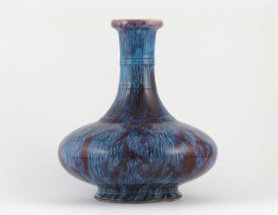 Appraisal: A Chinese bottle vase of compressed form with a flamb