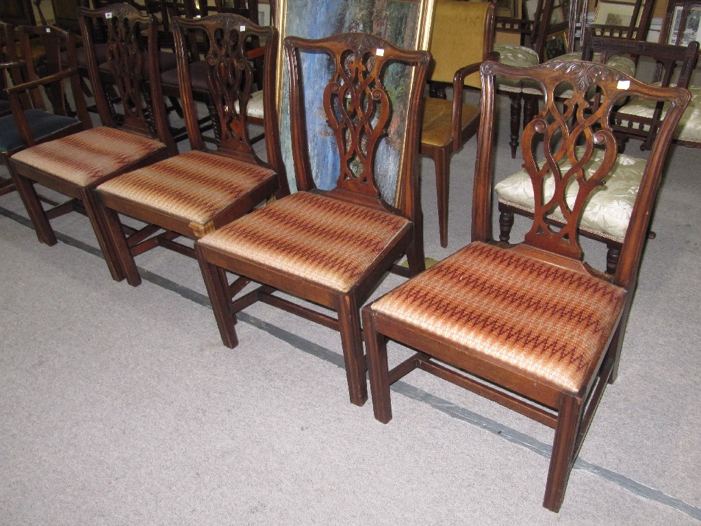 Appraisal: Set of four Edwardian mahogany dining chairs with pierced backs