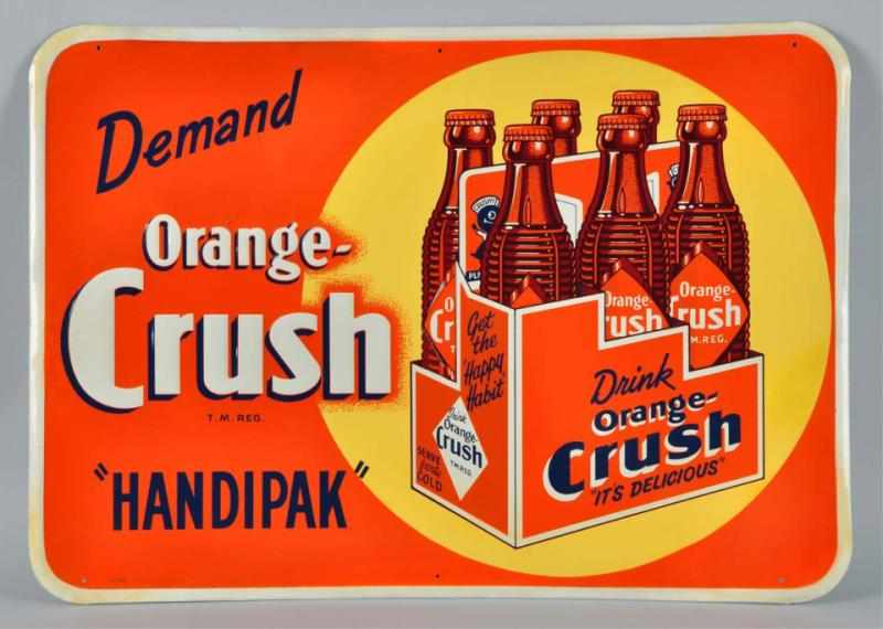 Appraisal: Embossed Tin Orange Crush Sign with -Pack Description Unusual sign