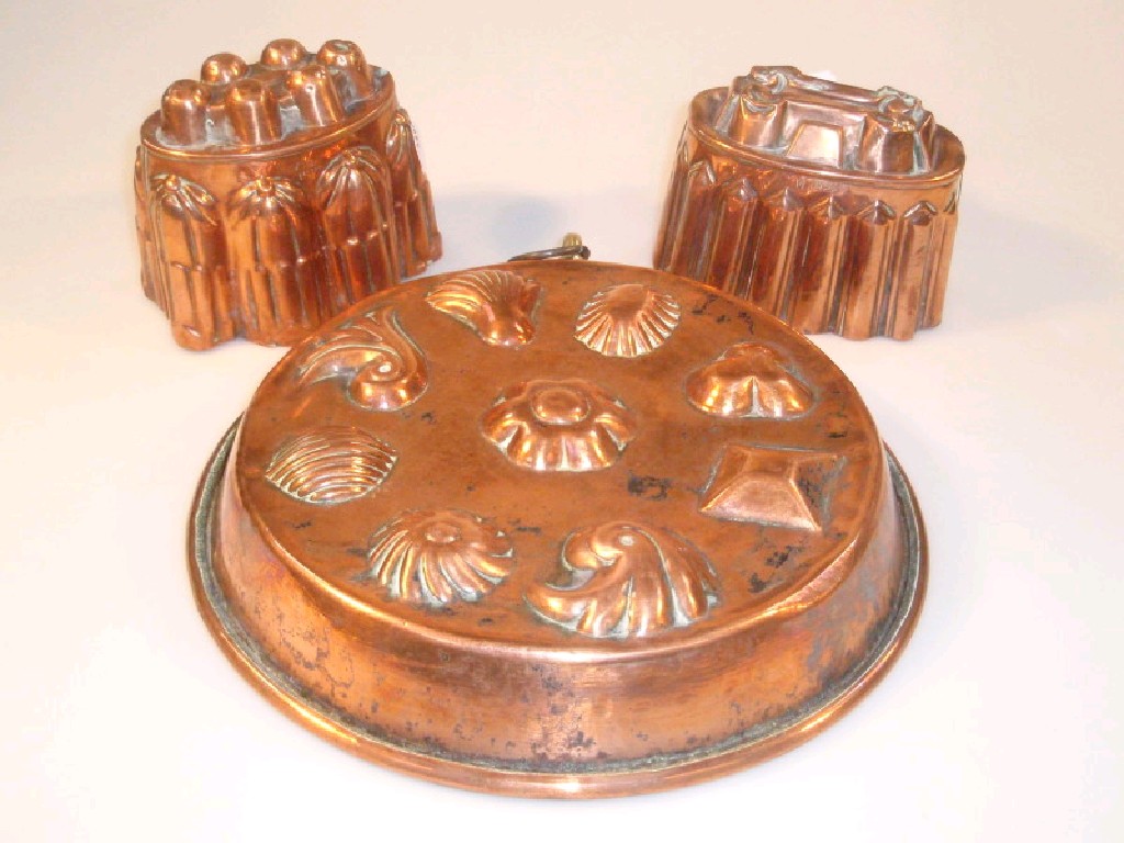 Appraisal: Two Victorian copper jelly moulds and a dish mould with