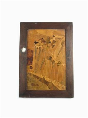 Appraisal: A continental marquetry panel depicting a mountain path with a