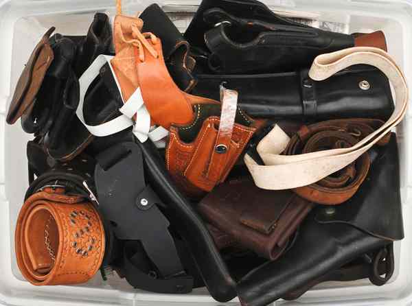 Appraisal: Assorted Lot of Gun Leather Approximately pieces assorted holsters belts