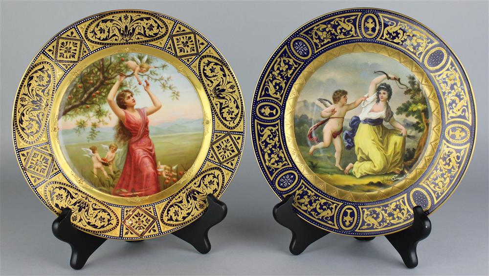 Appraisal: TWO SIMILAR ROYAL VIENNA STYLE BLUE GROUND CABINET PLATES PAINTED