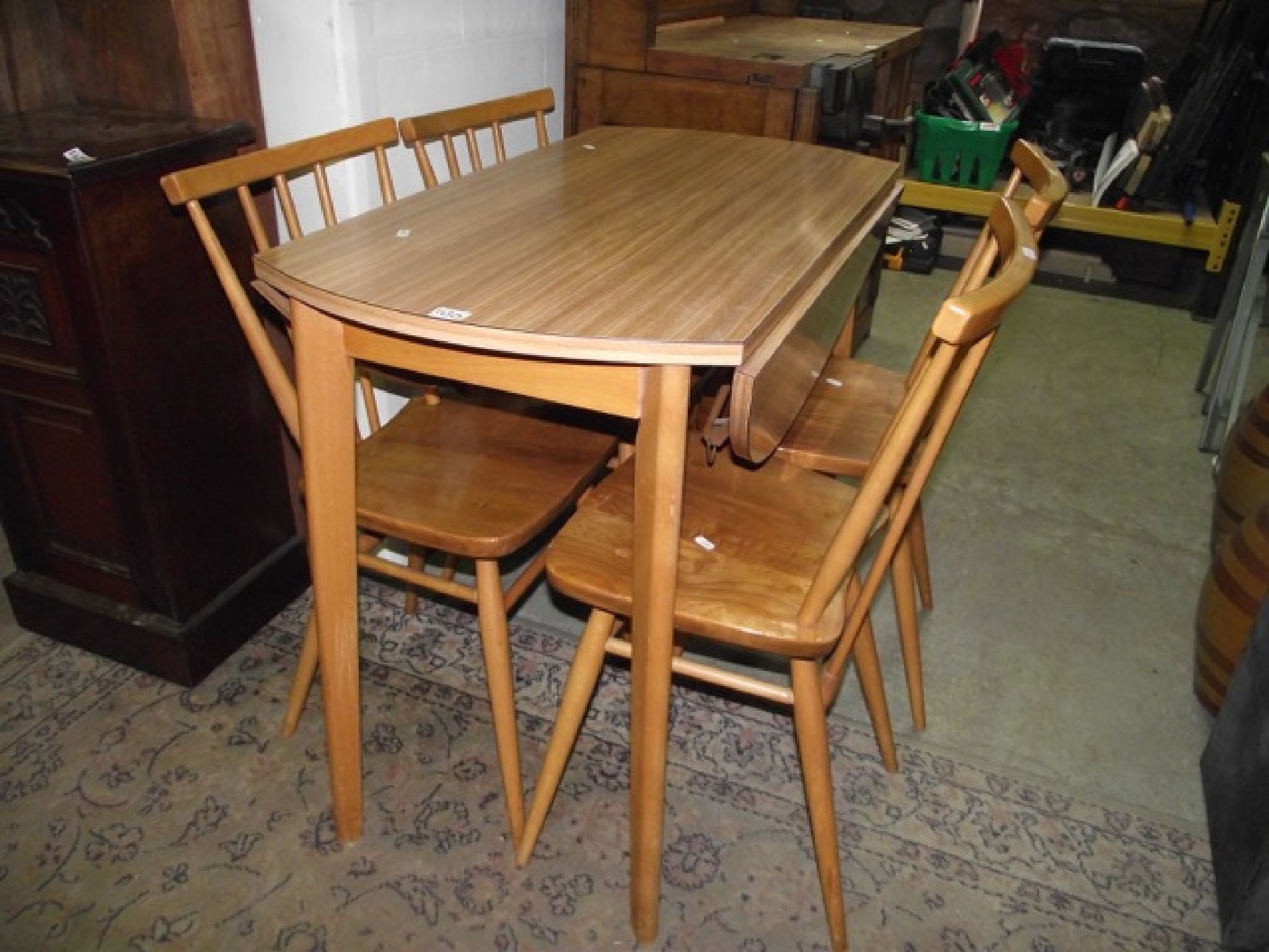 Appraisal: A set of four vintage Ercol elm and beechwood stickback