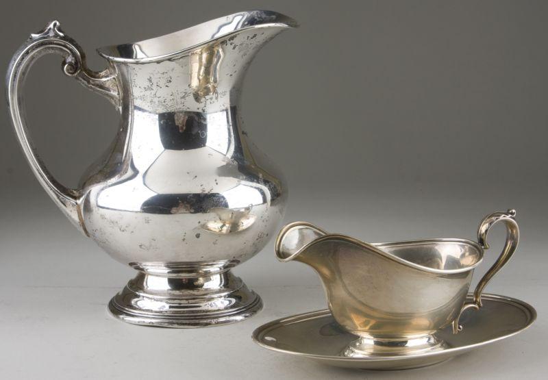 Appraisal: Sterling Silver Water Pitcher Gravy Boat Tray including a Reed