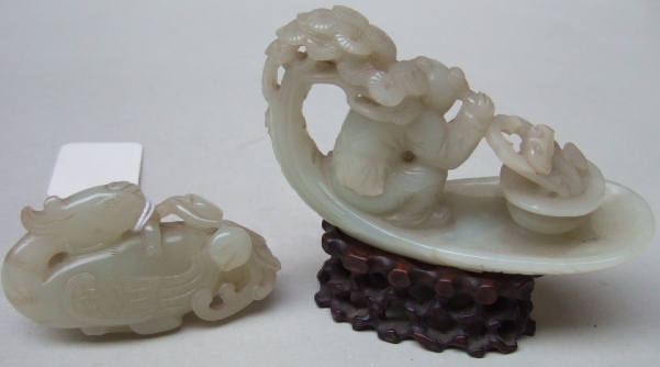 Appraisal: Two jade carvings th century comprising a study of a