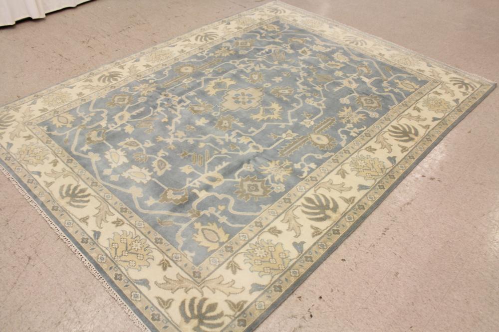 Appraisal: A CONTEMPORARY HAND KNOTTED ORIENTAL CARPET Indo-Persian overall stylized floral