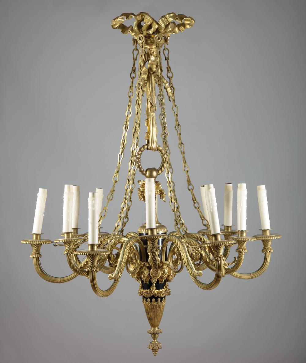 Appraisal: Continental Gilt Bronze Twelve-Light Chandelier ribbon and vase form standard