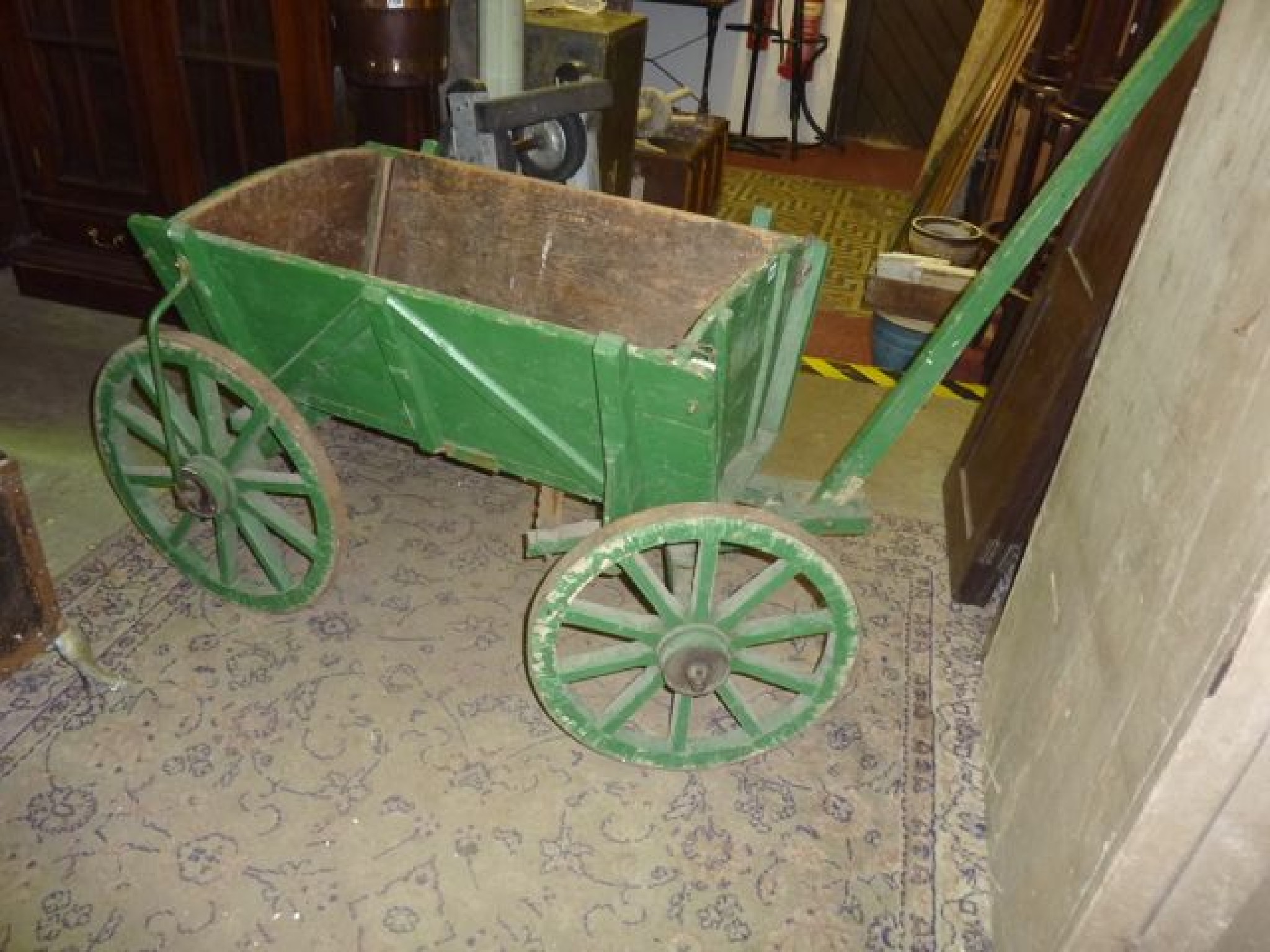 Appraisal: A traditional continental four wheel dog cart with painted finish