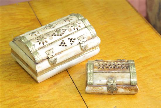 Appraisal: TWO ORNATE BONE BOXES Having pierced decoration and brass fittings