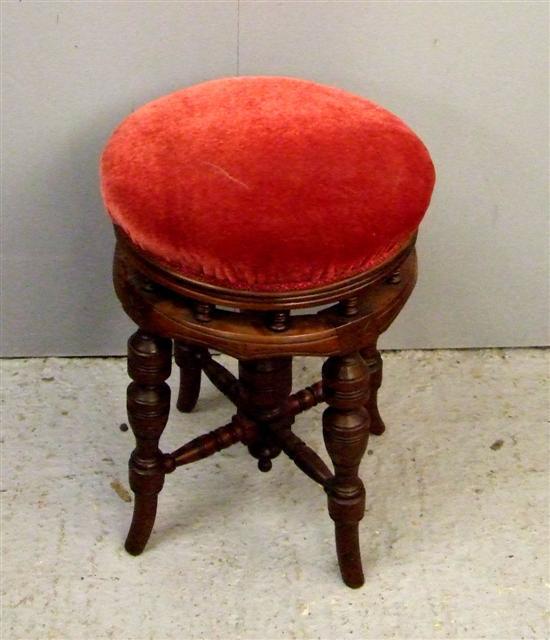 Appraisal: A Late th century walnut adjustable piano stool h in