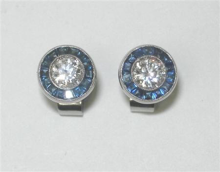 Appraisal: A pair of Art Deco style sapphire and diamond earrings