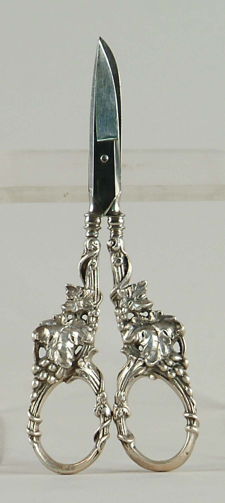 Appraisal: PAIR OF SILVER GRAPE SHEARS Fancy grape decorated handles unmarked