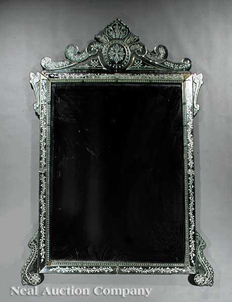 Appraisal: A Monumental Venetian Mirror early th c the rectangular mirror