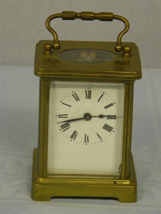 Appraisal: Brass and glass carriage clock high in leather case and