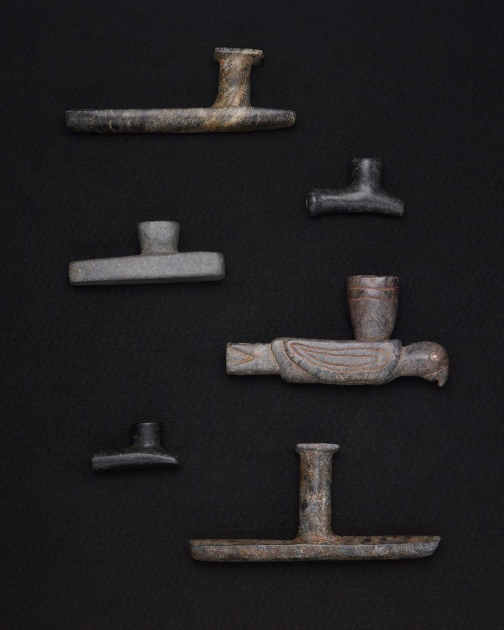 Appraisal: A group of carved stone pipes Pre-historic or later Comprising