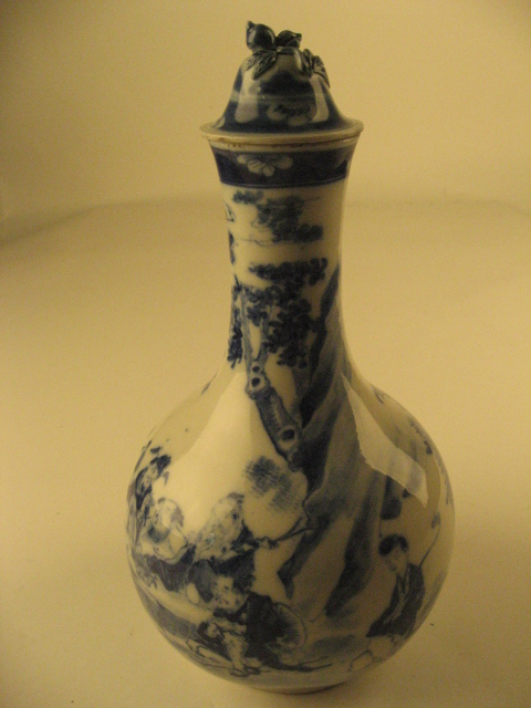 Appraisal: An Asian Blue and White Covered Bottle Vase with designs