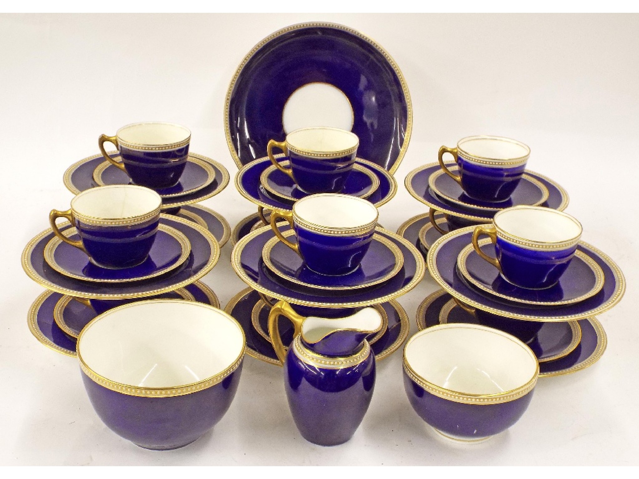 Appraisal: Royal Worcester s part tea service decorated in cobalt blue