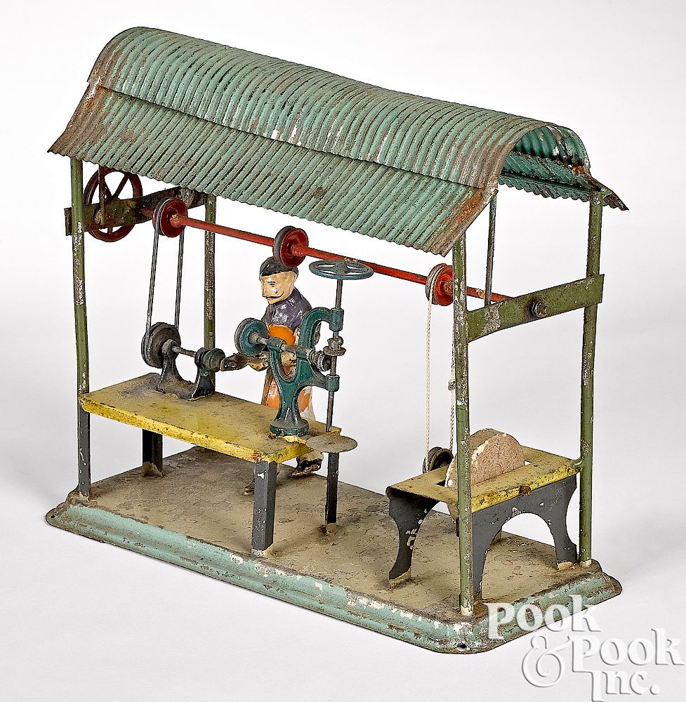 Appraisal: Painted tin machine shop steam toy accessory Painted tin machine