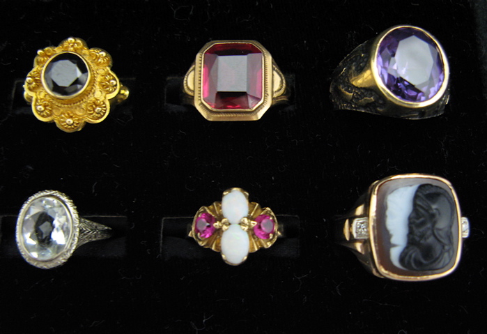 Appraisal: A COLLECTION OF TWELVE RINGS in settings ranging from K