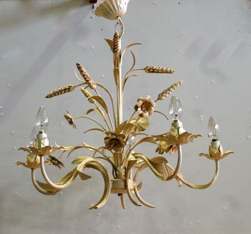 Appraisal: A painted iron five branch chandelier in the form of