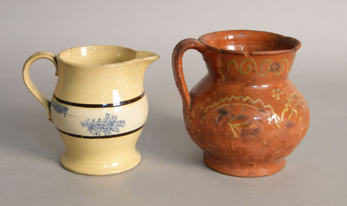 Appraisal: Mochaware yelloware cream pitcher th c with seaweed decoration together