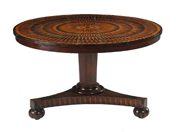 Appraisal: The circular top inlaid with alternating geometric bands radiating from