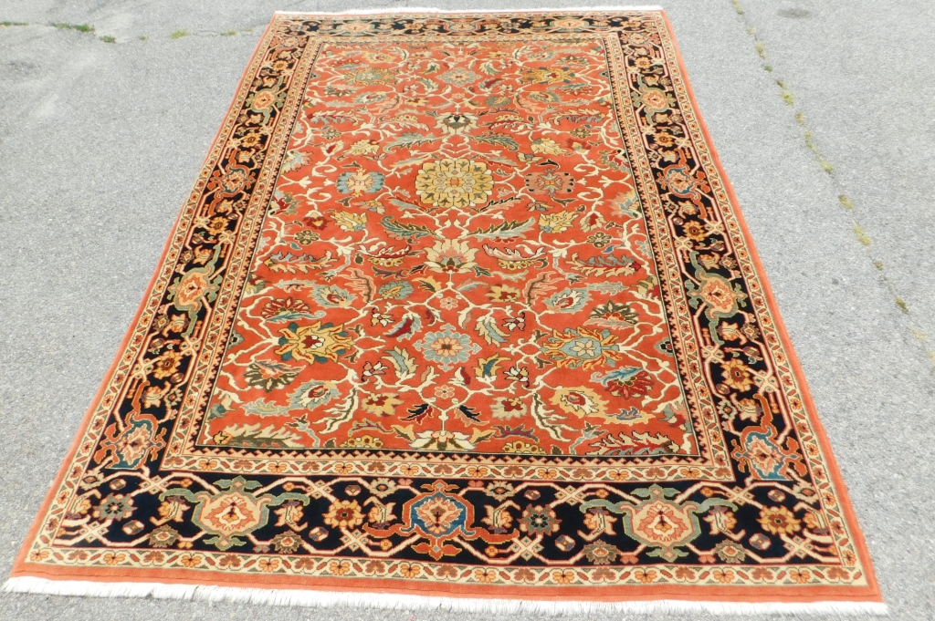 Appraisal: LG RED BOTANICAL RUG Middle East th CenturyYellow blue green