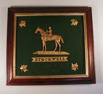 Appraisal: A framed and glazed gilt metal relief plaque of horse