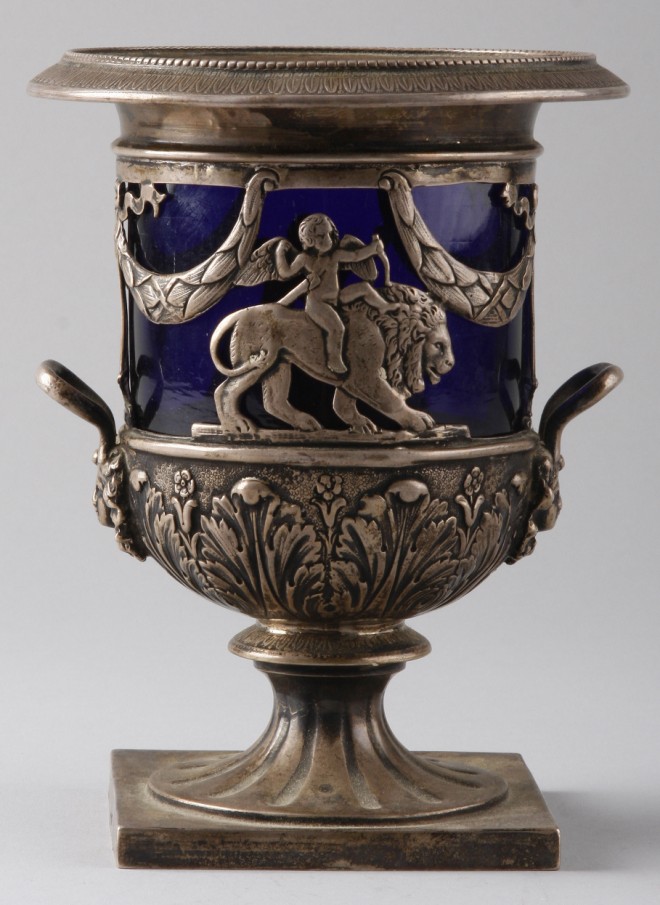 Appraisal: Urn features classical motif with columns and putti cobalt blue