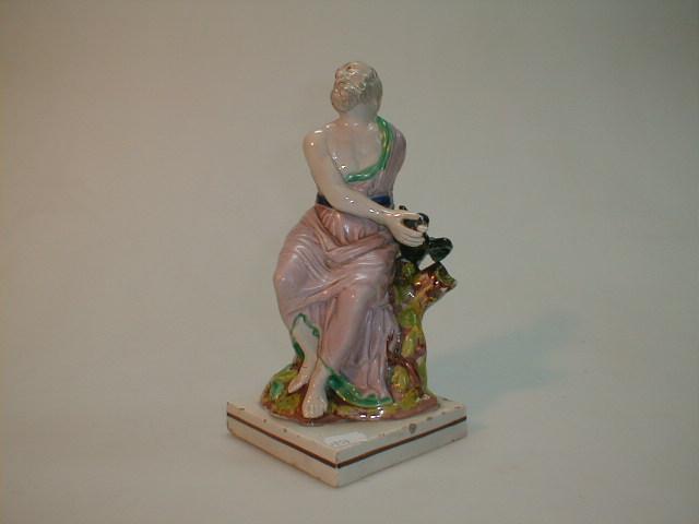 Appraisal: A thC Staffordshire pearl ware figure of Elijah and the