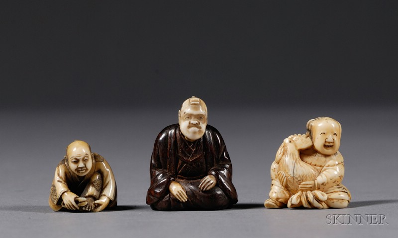 Appraisal: Three Netsuke th century two ivory a boy with a