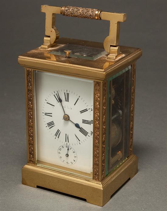 Appraisal: French brass and beveled glass repeater carriage clock late th