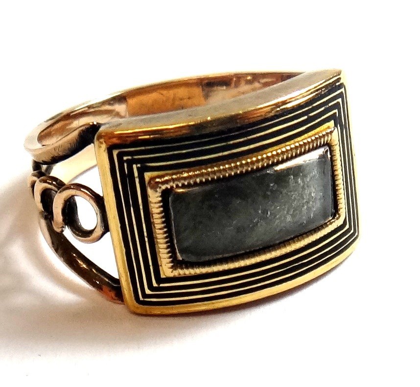 Appraisal: A George III gold and black enameled rectangular mourning ring