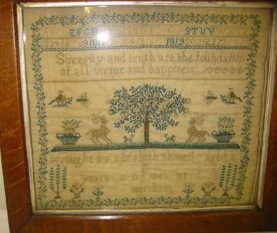 Appraisal: A WOOLWORK SAMPLER worked by Elizabeth Shimell and dated and