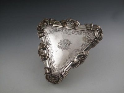 Appraisal: A George II silver kettle stand by James Shruder London