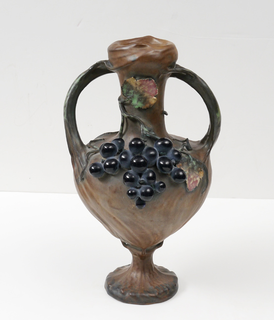 Appraisal: AMPHORA GRAPE VINE DOUBLE HANDLED VASE Vine appearance handles with