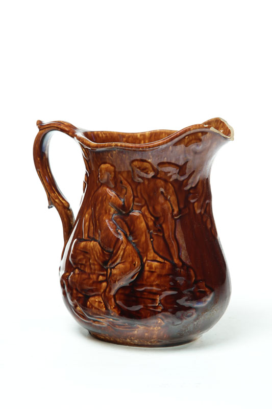 Appraisal: ROCKINGHAM PITCHER American mid th century Molded Psyche and Cupid